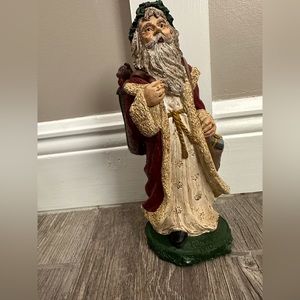 Hand painted pecan resin Santa statue